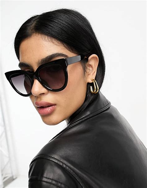 ASOS DESIGN chunky flare cat eye sunglasses in shiny black.